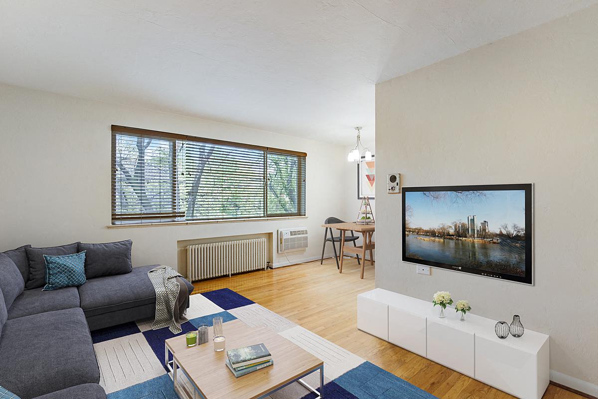 a living room with a couch and a tv