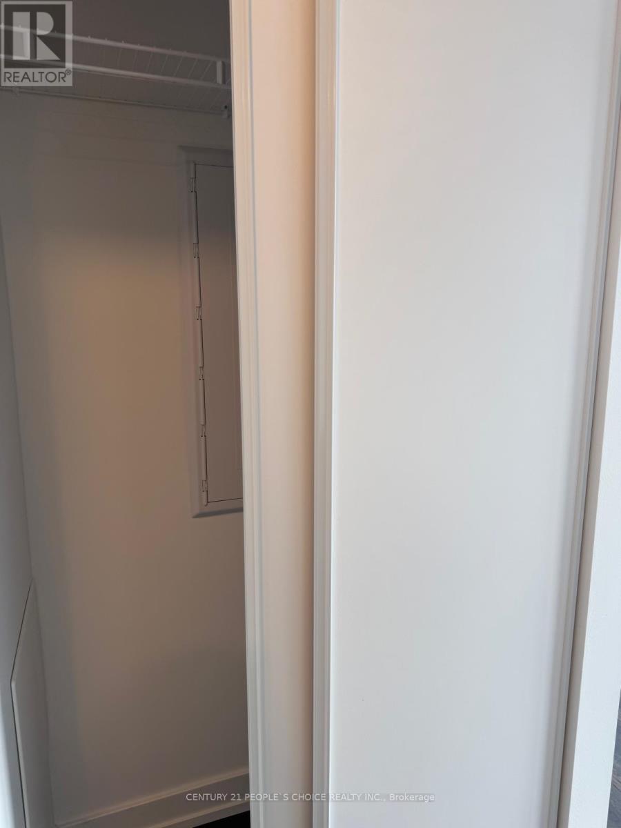 A white door with a glass window in the middle.
