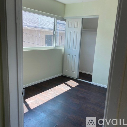 A room with a door and a window.