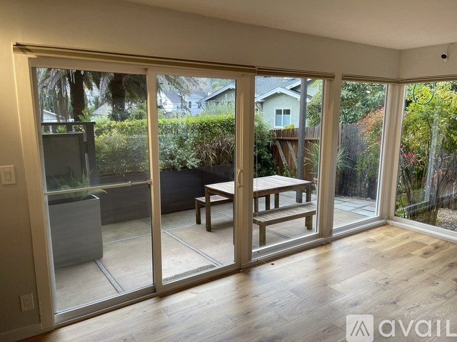 A room with a table and chairs in it.