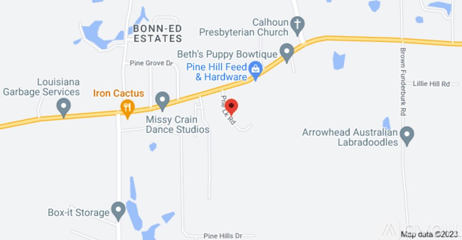 A map shows a red marker at a location between Missy Crain Dance Studios and Pine Hill Feed & Hardware.