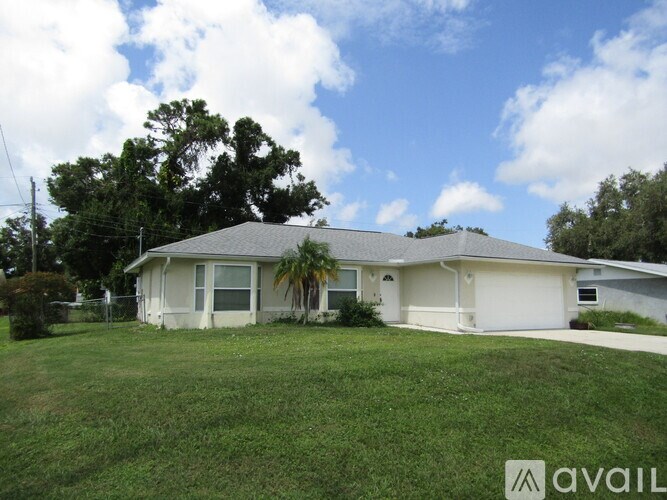 A house with a lawn in front of it is for sale.