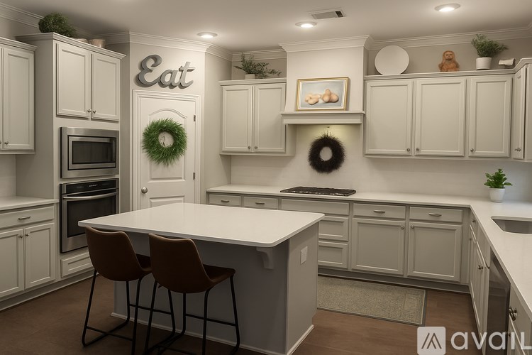 A kitchen with a white countertop and brown chairs.