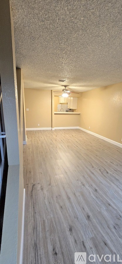 A room with a light brown floor and a white ceiling.