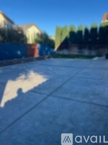 A shadow of a person is on the ground.