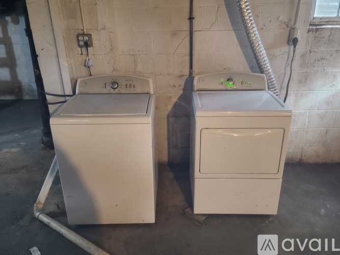 Two old washing machines are available for purchase.