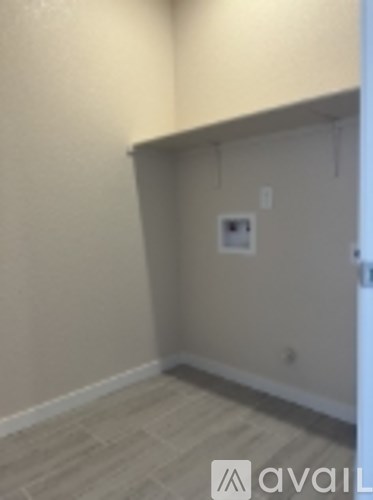 A wall with a switch and a light socket on it.