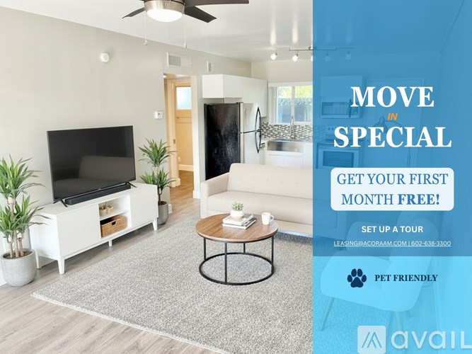 A living room with a television, a sofa, and a coffee table is on display.