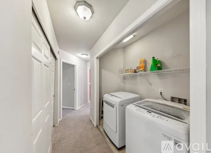 A laundry room with a washer and dryer.