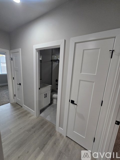 A white door is on the right side of the image.