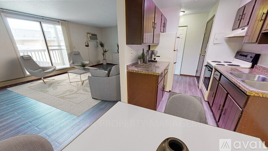 A kitchen and living room are shown in this image.