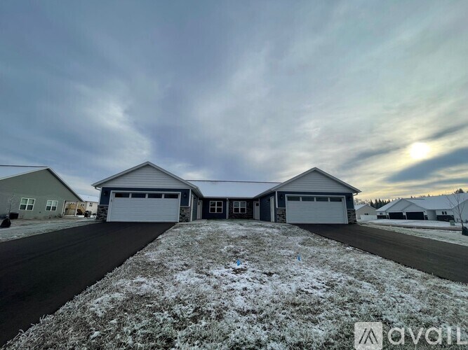 A house with a garage is shown in the image.