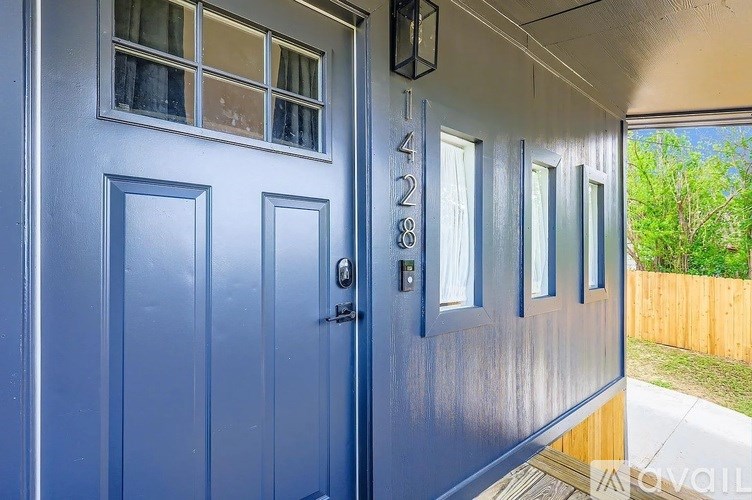 A blue door with the number 4288 on it.
