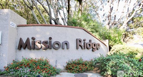 A wall with the words "Mission Ridge" on it.