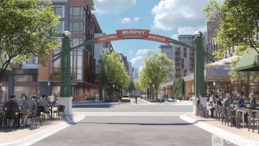 A street view of Murphy Avenue with people sitting at outdoor tables.