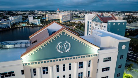 A building with the letters WR on it is in the foreground.