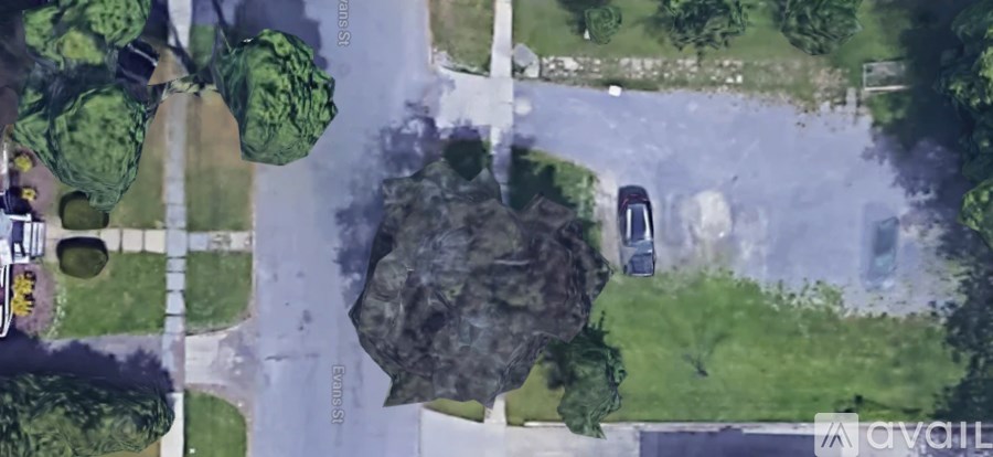 A car is parked on the side of a road.