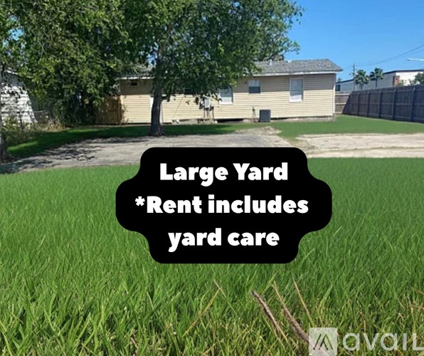 A sign in a field advertises that the rent includes yard care.