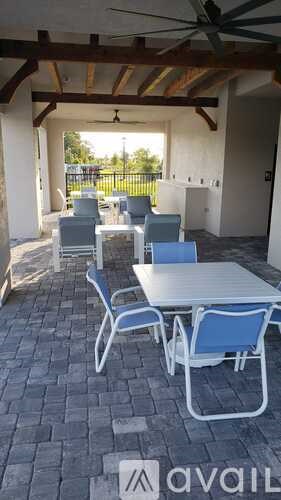 A patio with a table and chairs is available for rent.