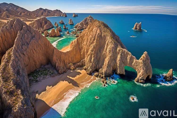 A beautiful beach with clear blue water and white sand.