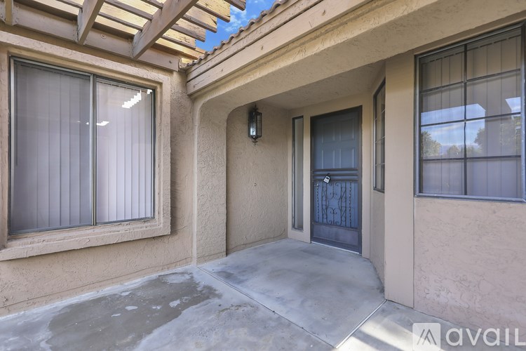 A house with a patio and a door.
