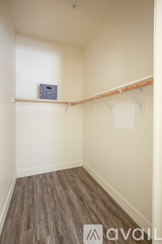 A room with a shelf and a box on it.