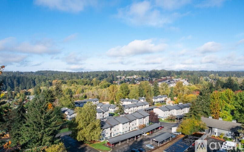 A bird's eye view of a residential area with houses and trees.