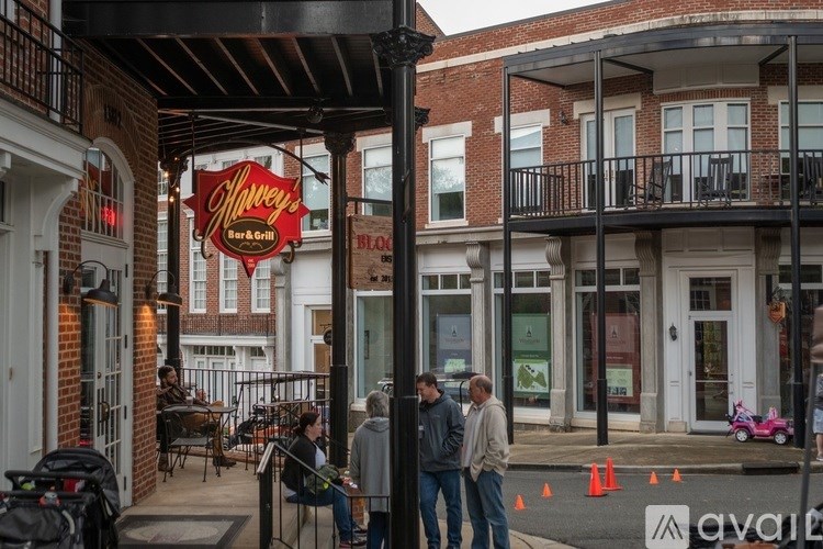 A group of people are standing outside of a Shipley's Irish Pub.