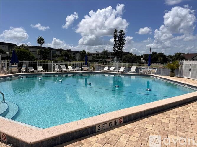 A large swimming pool with the depth marked 3 feet 6 inches.