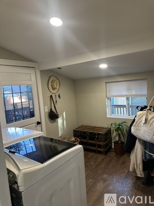 A laundry room with a washer and dryer.