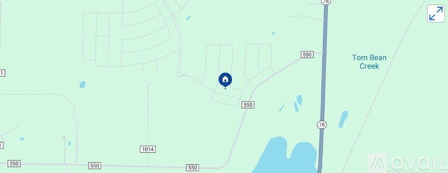 A map shows a location near Tom Bean Creek.