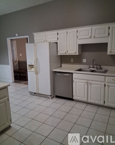 A room with a window on the right side.