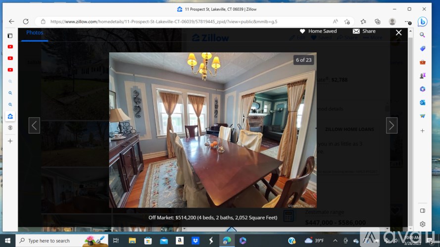 A room with a wooden table and chairs is displayed on a computer screen.