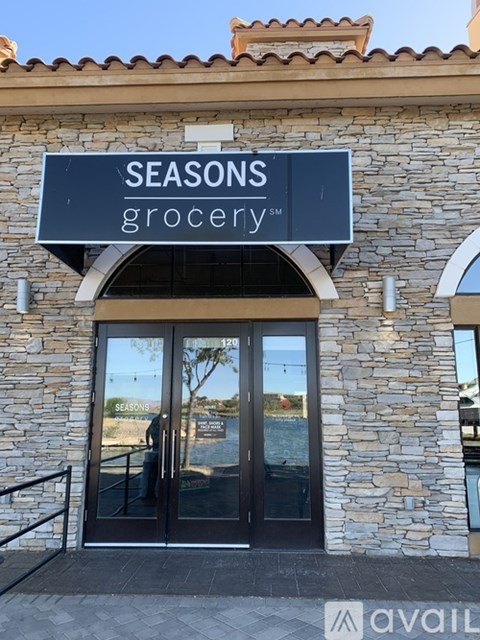 The entrance to a grocery store named Seasons.