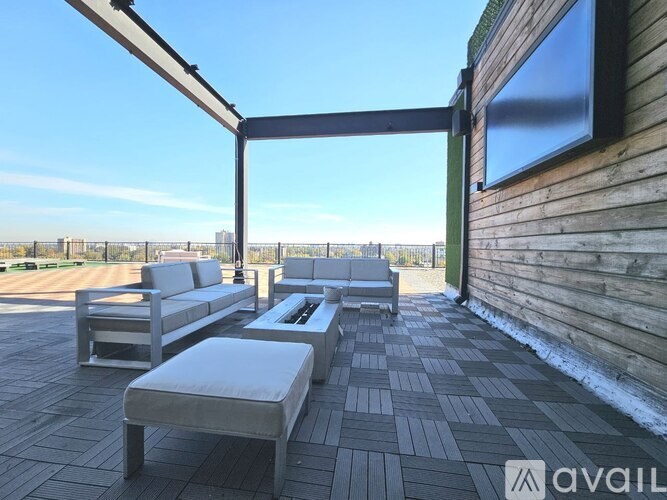 A patio with a table and chairs is available for rent.