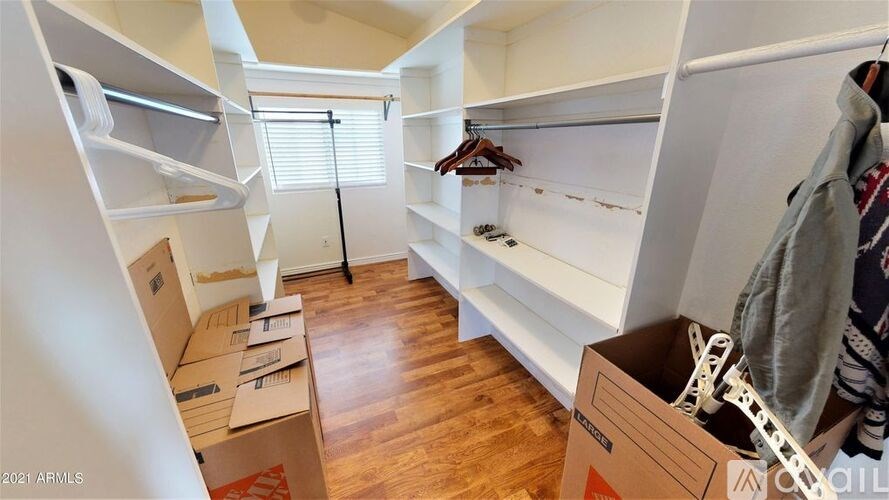 A room with a lot of boxes on the floor.