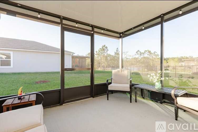 A patio with a table and chairs is available for rent.