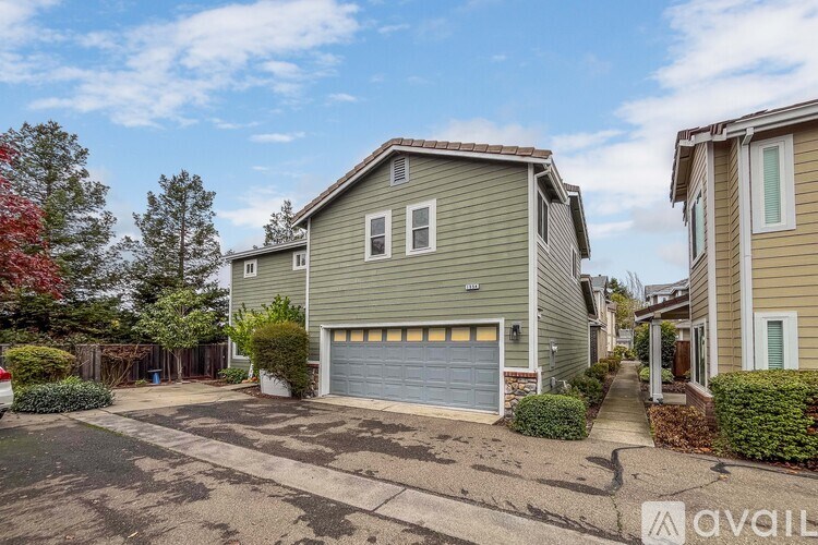 A house with a garage is available for rent.