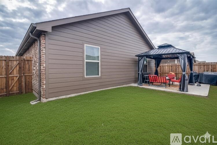 A house with a covered patio area.