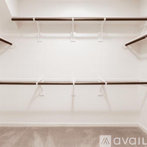 Empty shelves in a white room.