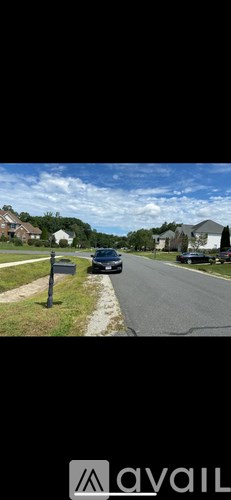 A car is parked on the side of a road.