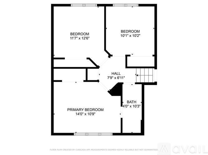 A floor plan for a home with a primary bedroom, two additional bedrooms, a hall, and a bathroom.