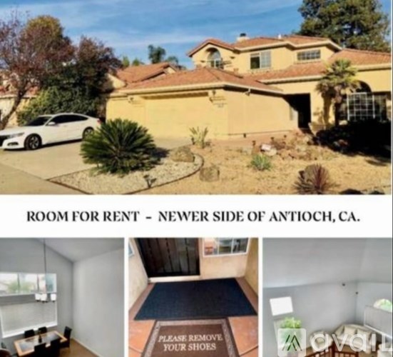 A room for rent sign is displayed in front of a house.