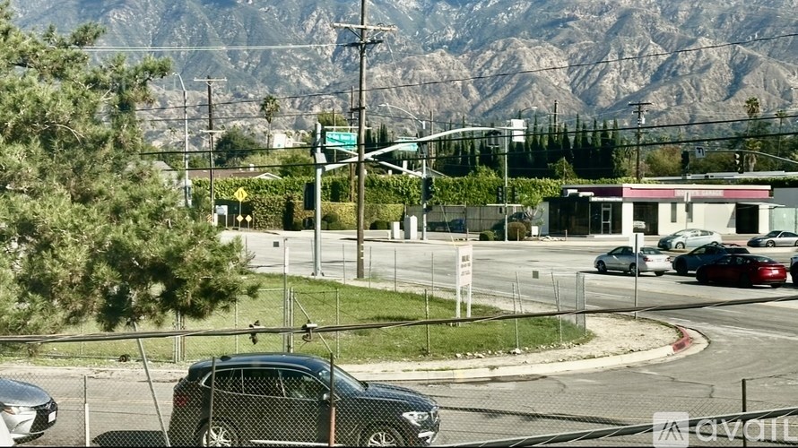 A car is parked on the side of the road.