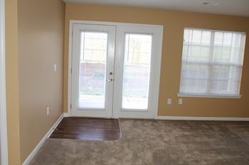 front door with windows in apartment 