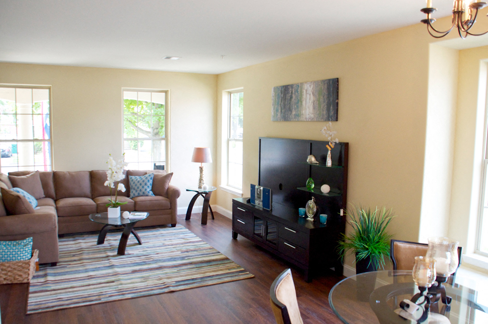 a living room with a couch and a table