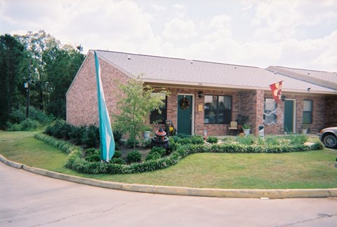 A house with a flag on the front.