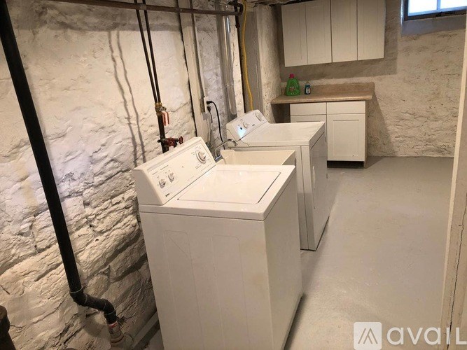 A laundry room with a washer and dryer.