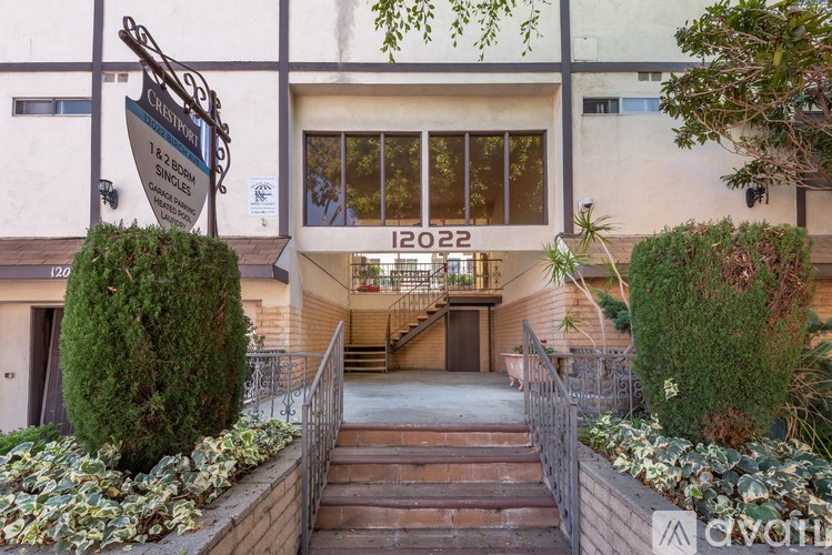 A building with a sign that says 12022 is shown.