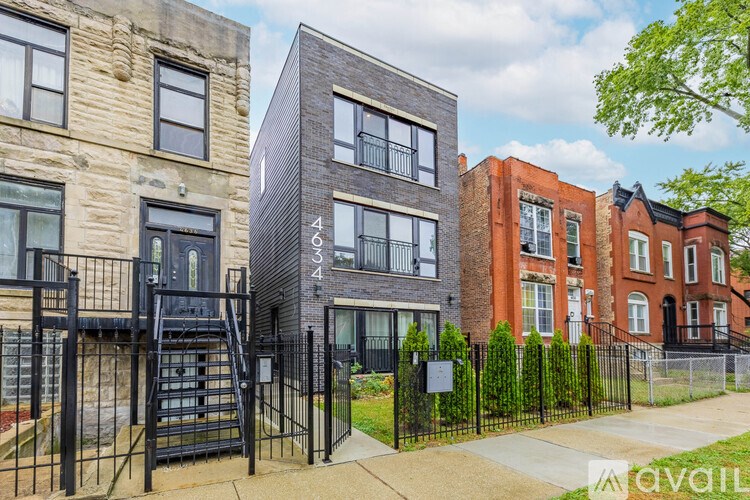 A row of houses with the numbers 34 and 34A on them.